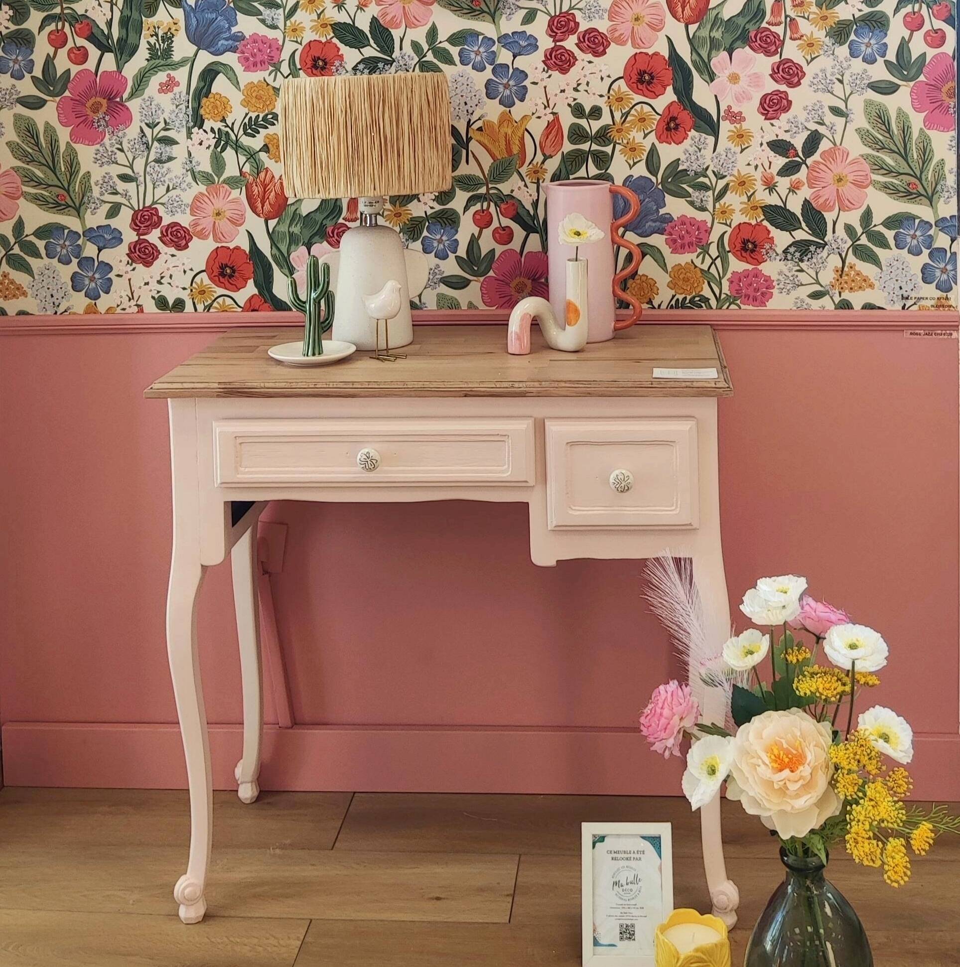 Console with 2 drawers, pink, wooden top.