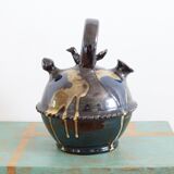 Glazed terracotta gargoulette with bird decoration