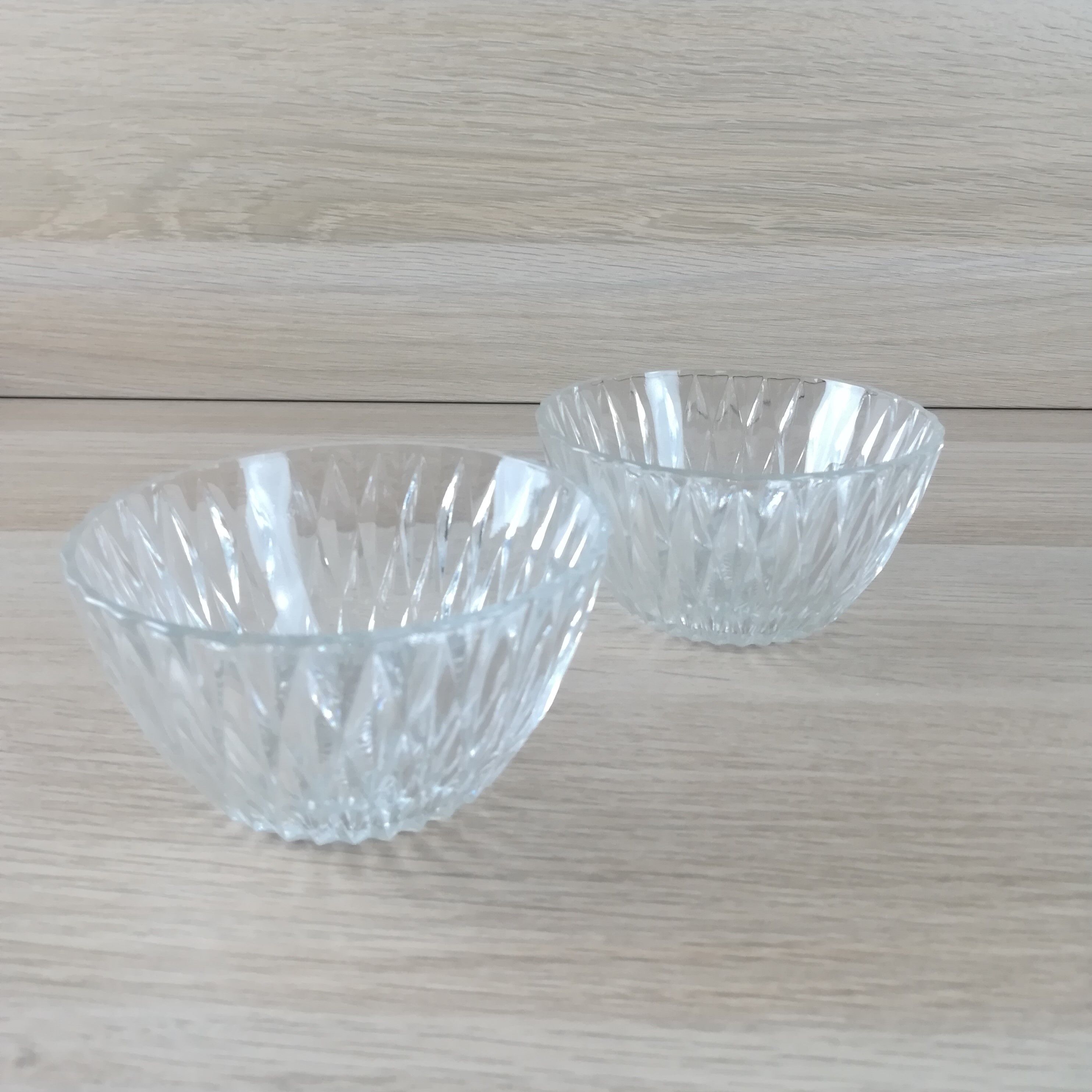 2 faceted glass cups