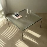 Minimalist 1960s wire glass coffee table in stainless steel.