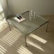 Minimalist 1960s wire glass coffee table in stainless steel.