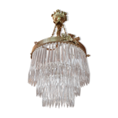 Former bronze chandelier with crystal stamps carved from the late 19th century.