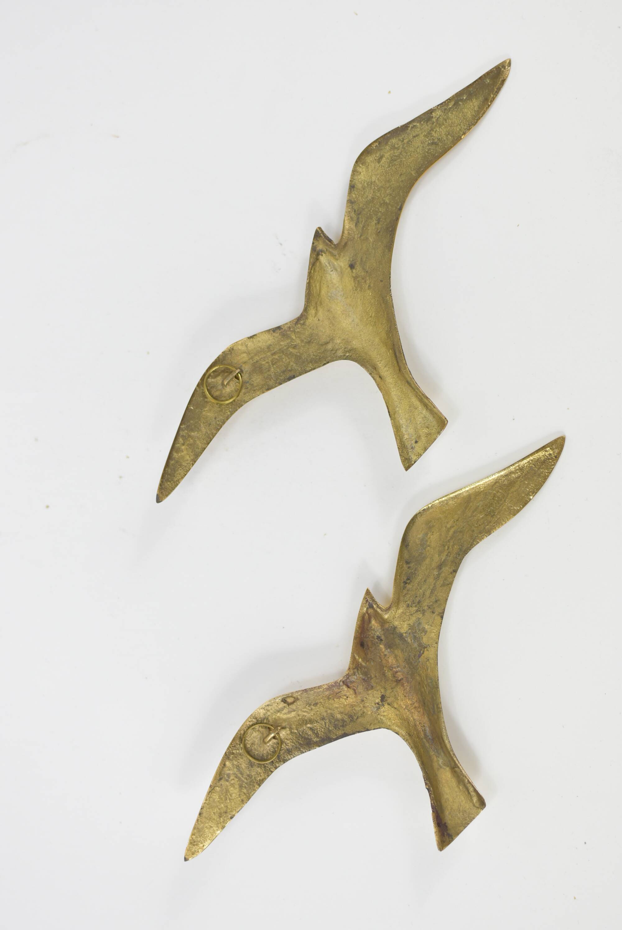 Pair of brass birds