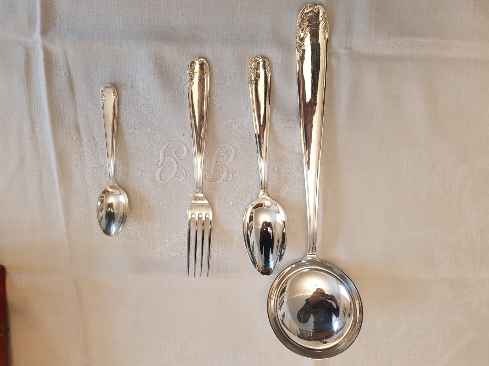 Silver cutlery set with 36 place settings and ladle