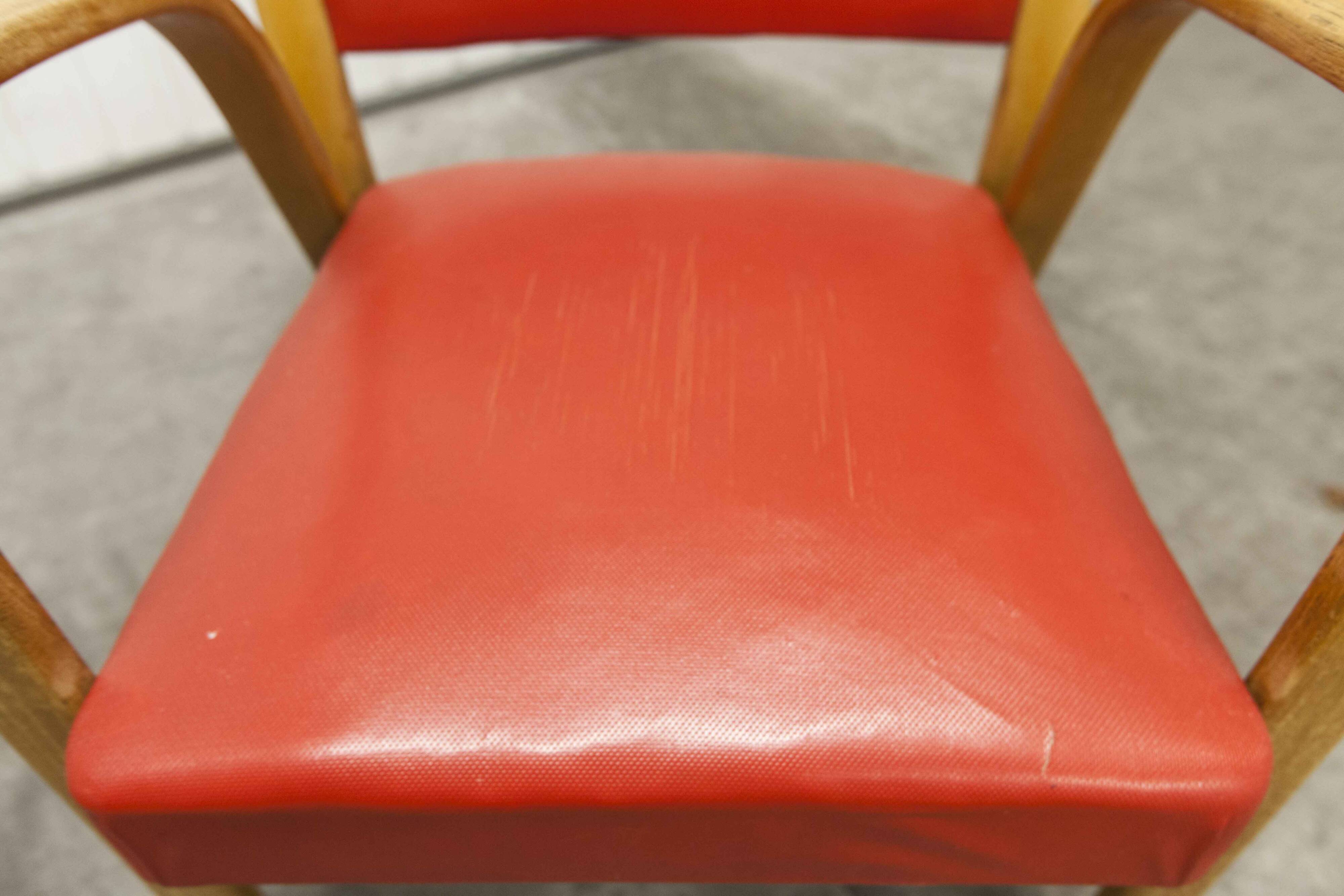 Bow wood armchair by Hugues Steiner 1960 red