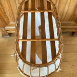 Bamboo, rattan, wicker cradle bassinet from the 1960s with a foldable support.