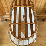Bamboo, rattan, wicker cradle bassinet from the 1960s with a foldable support.