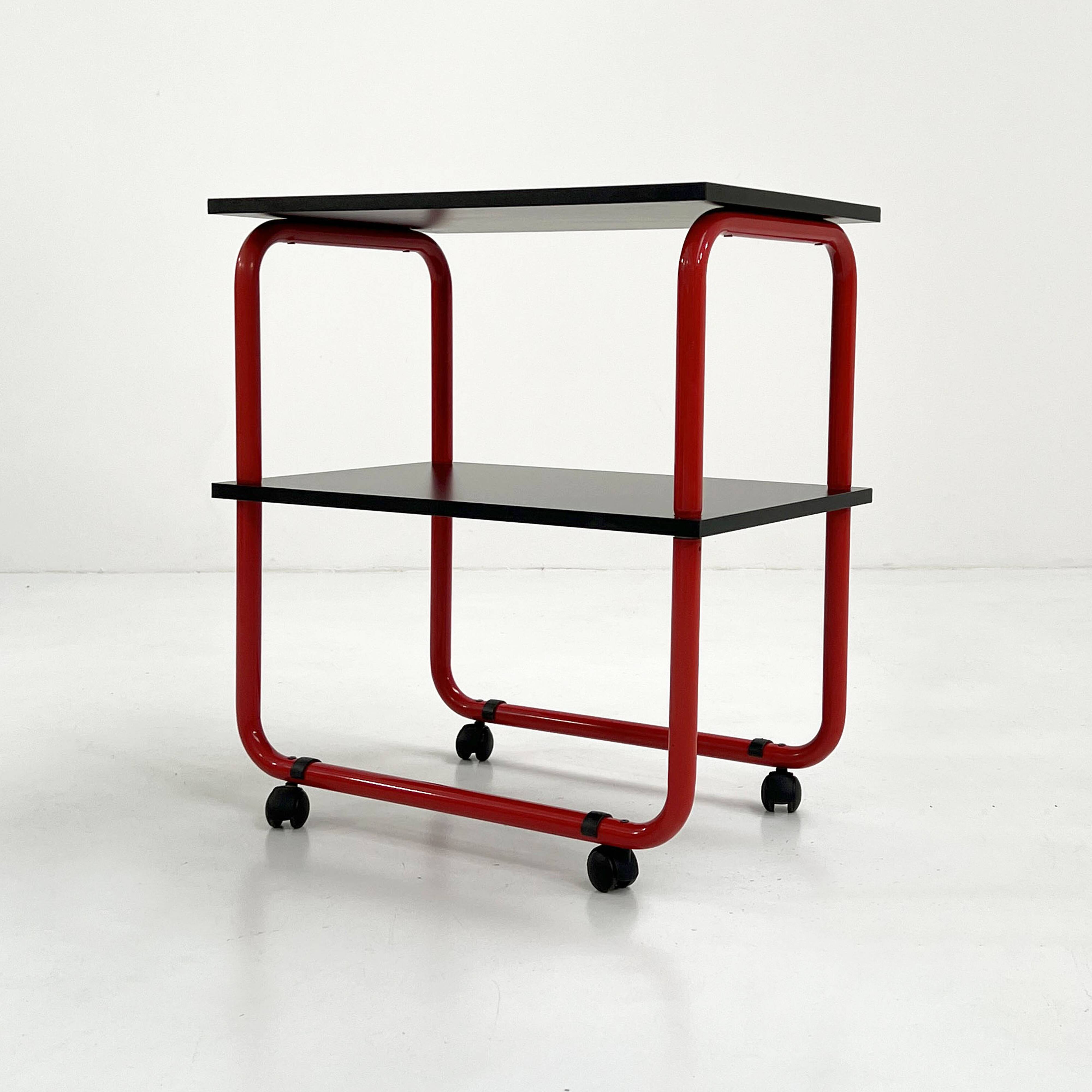 Tubular metal and wood serving trolley, 1980