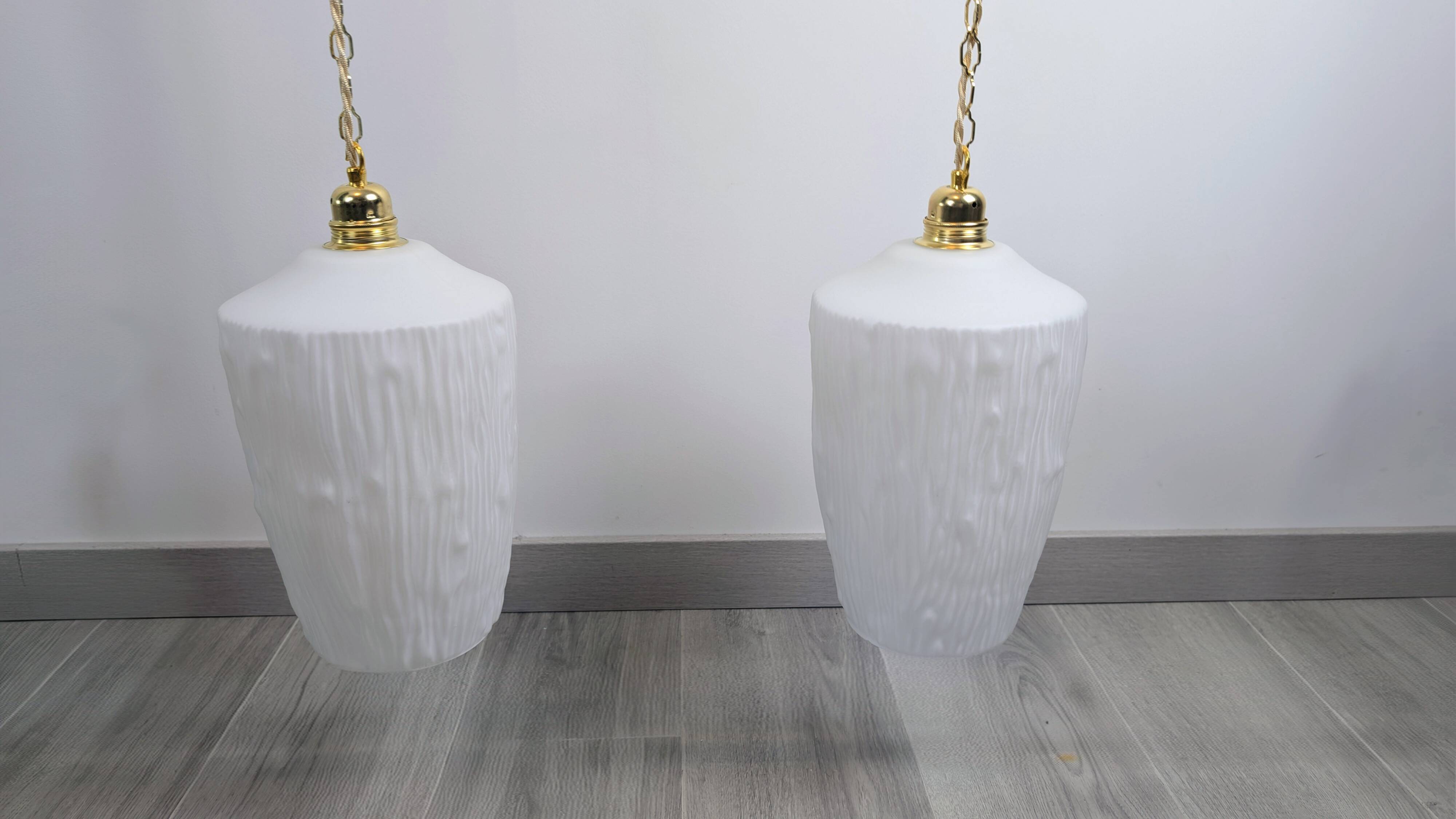 Pair of opaline pendants from the 1960s, luminous simplicity, 140 cm.