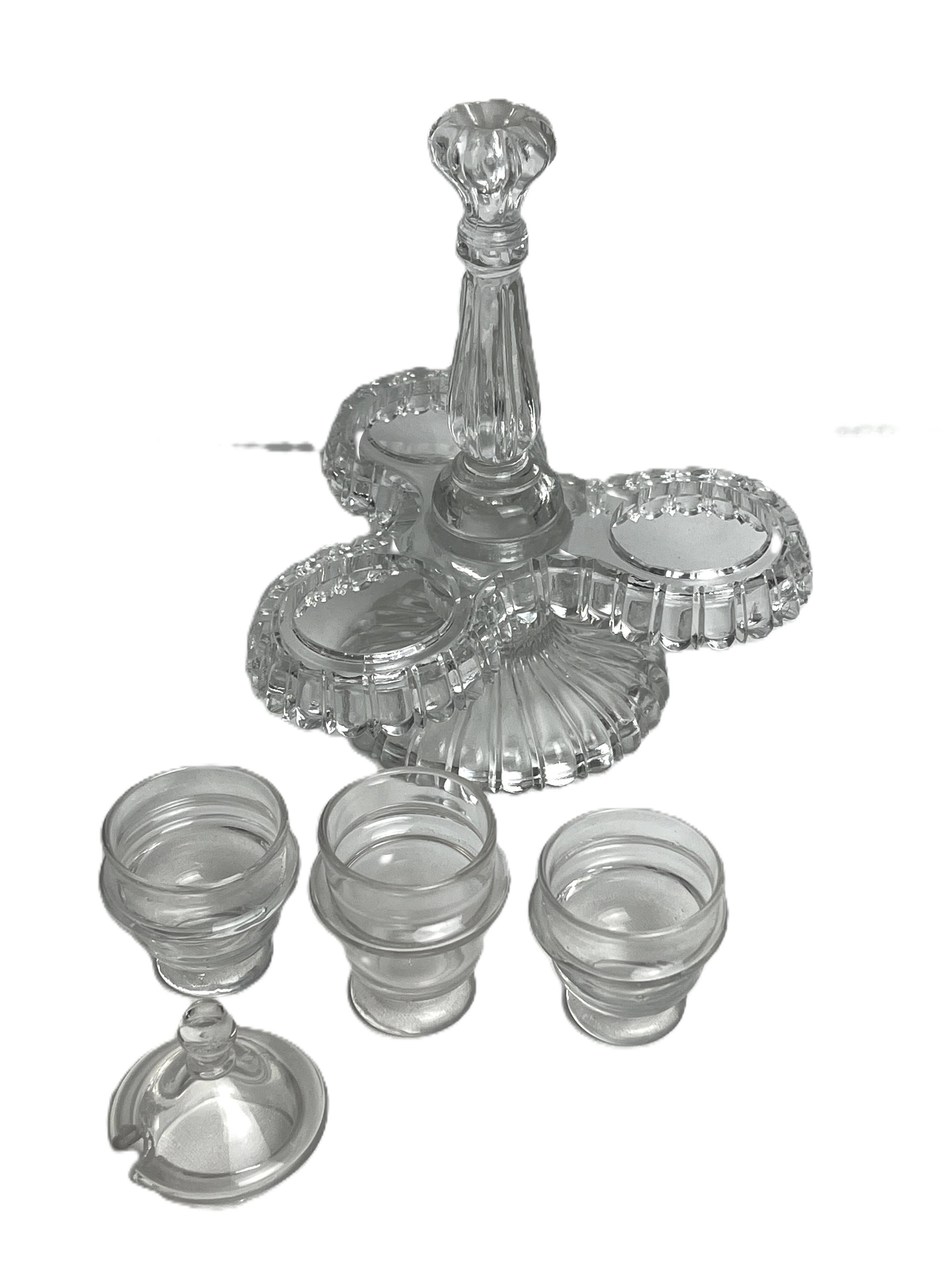 Tableware, two moulded glass table servants from the early 20th century.