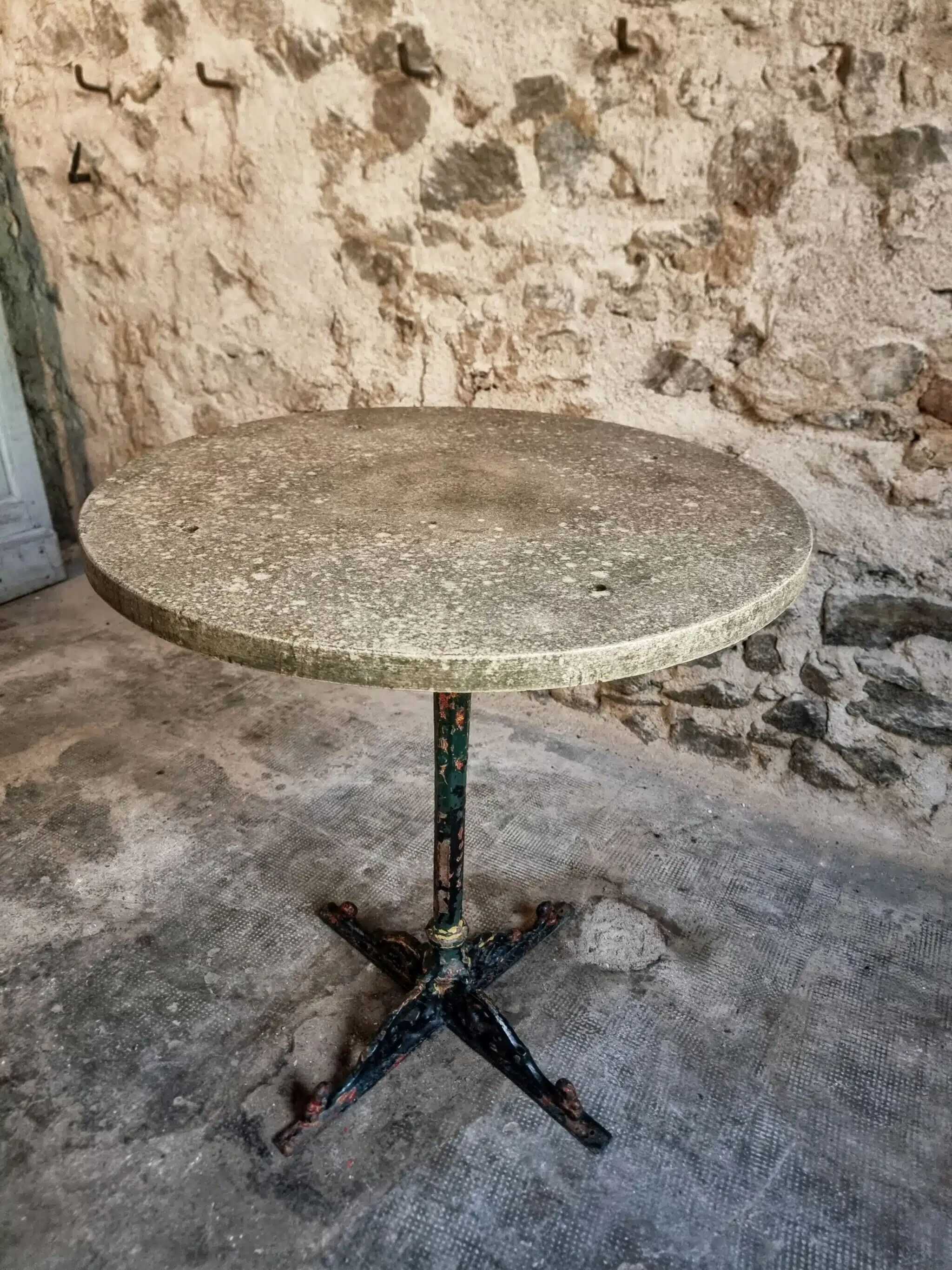 Bistro table / old garden with a cast iron base and stone top, France