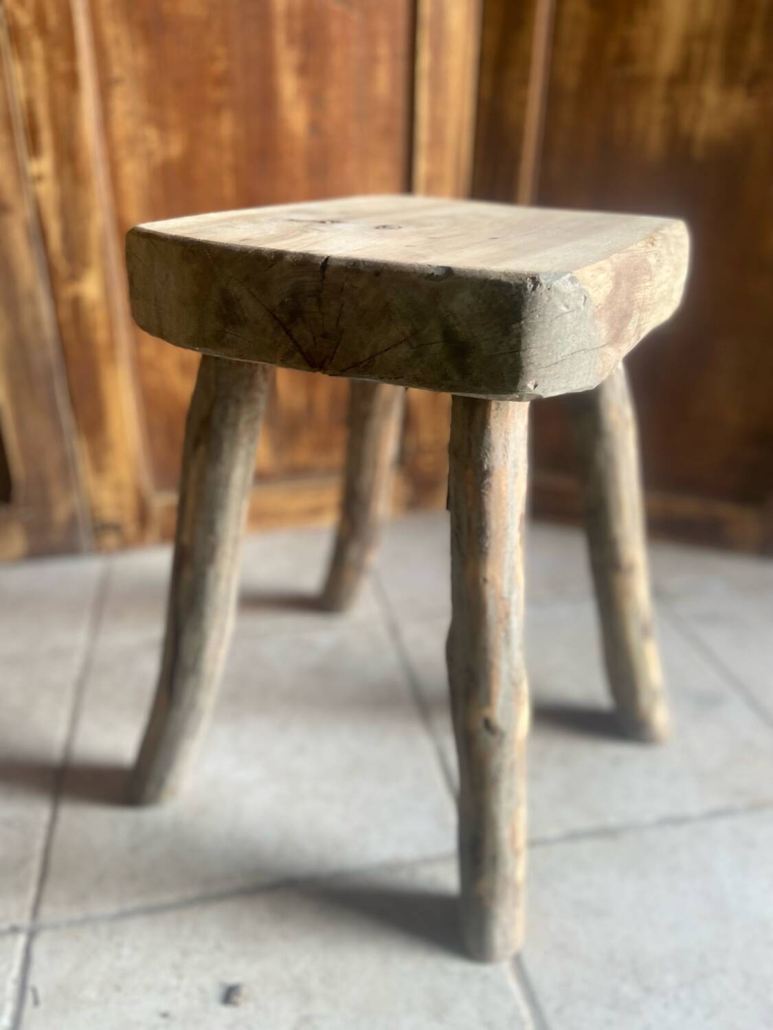 Antique brutalist stool in solid oak