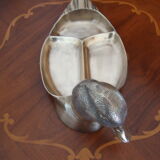 Empty pocketed old duck in solid brass
