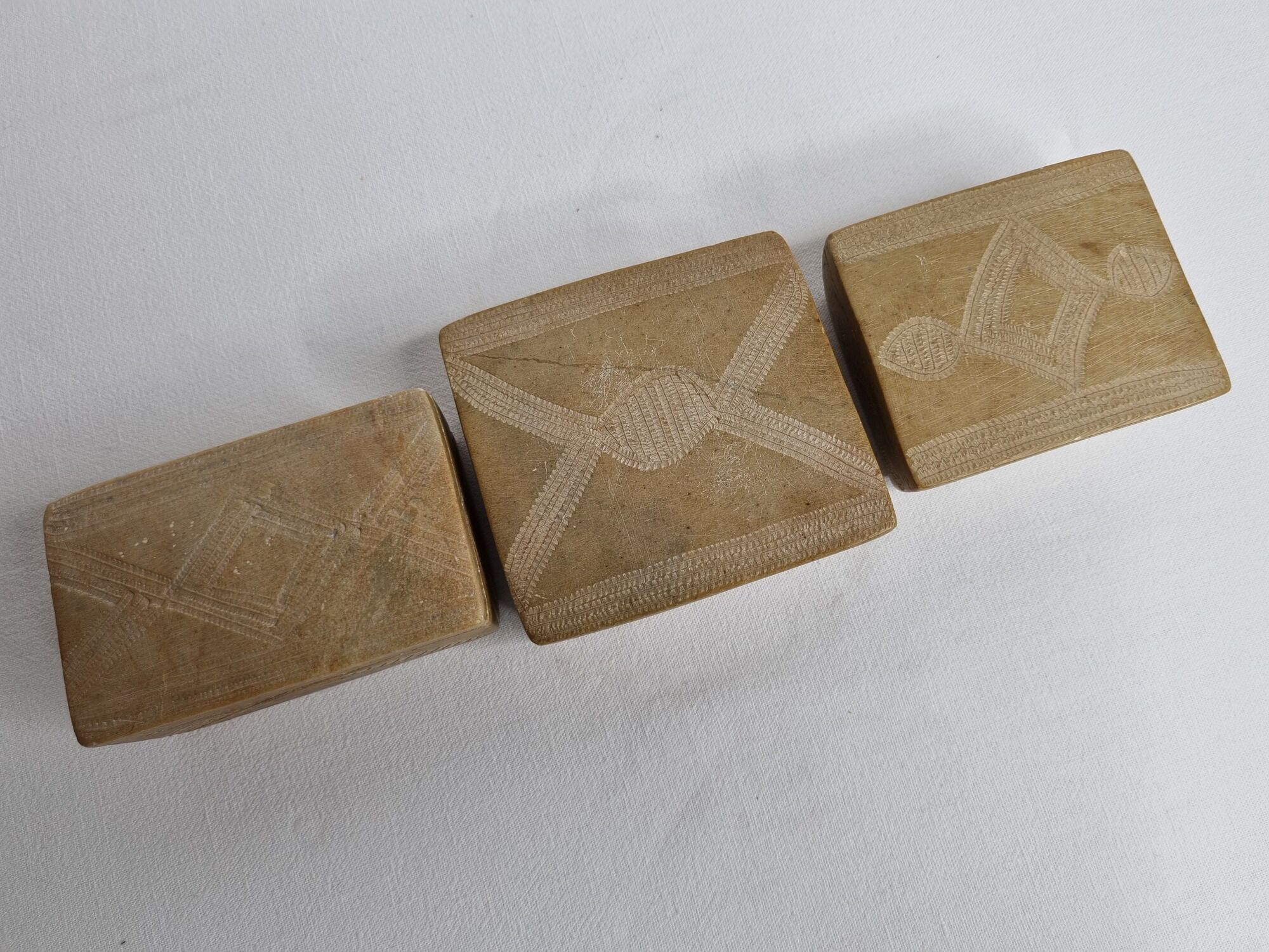 Set of three soft stone jewellery boxes decorated with traditional Tuareg motifs
