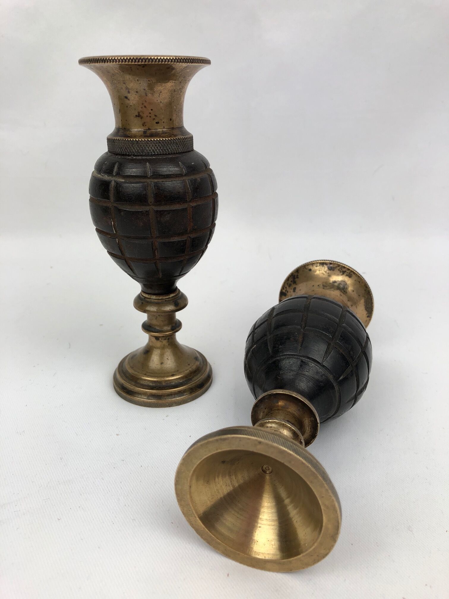 Pair of "Grenade" candlesticks, bronze, 20th