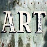 Sign letters forming the word "art"