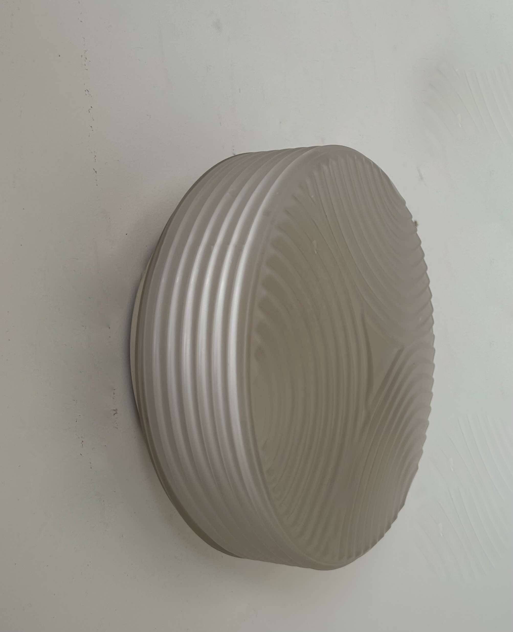 Vintage wall lamp in pressed molded sandblasted glass, France 1960