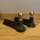 Pair of Napoleon III andirons from the 19th century in cast iron and brass