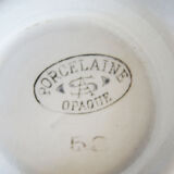 Ancienne saucière en porcelaine opaque SA
