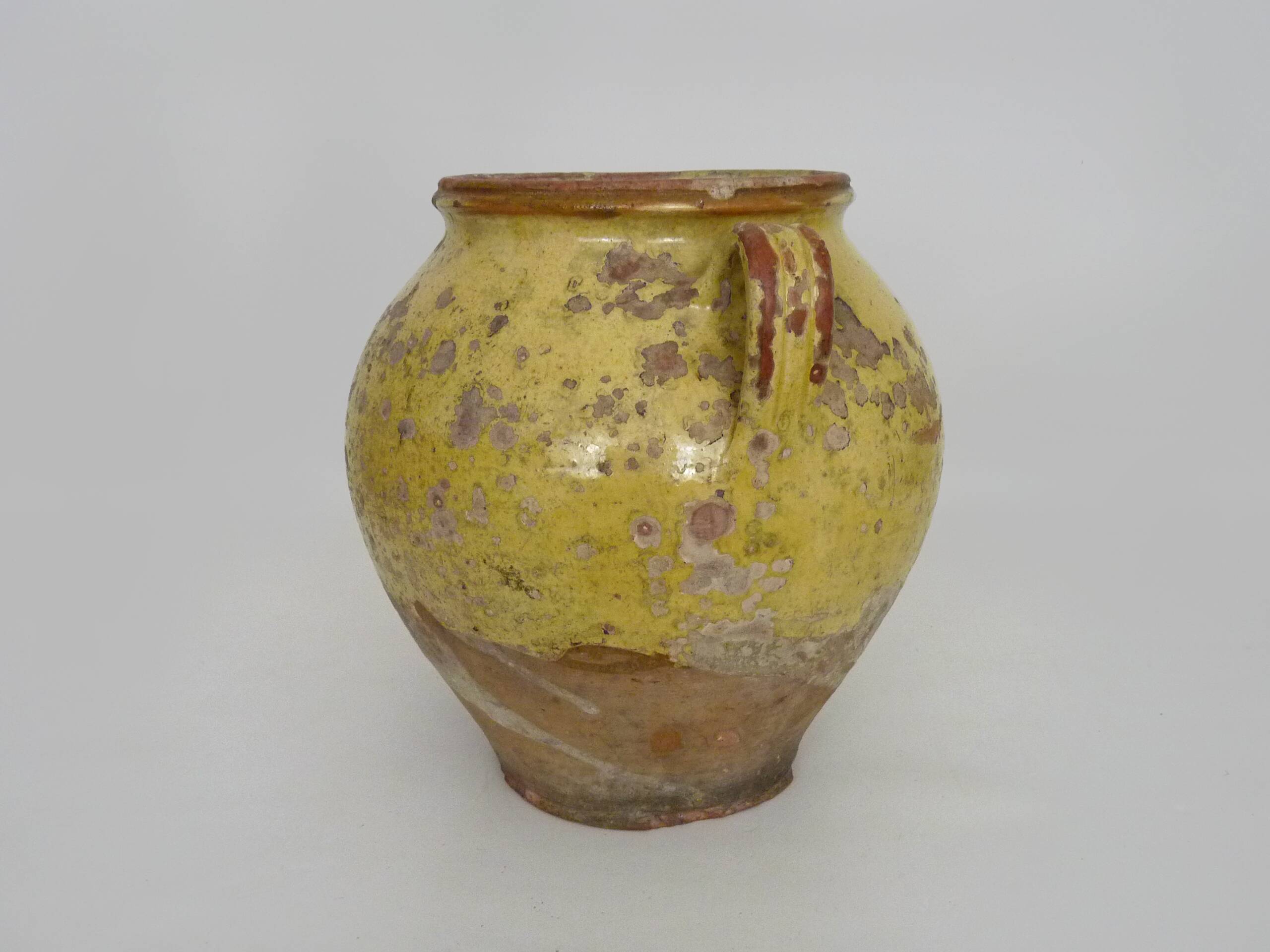 Magnificent glazed yellow confit pot, south-west of France. 19th century.