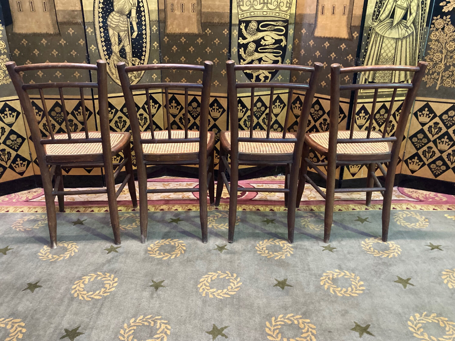 4 tanned bistro chairs