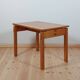 Meticulously crafted vintage pine side table, a masterpiece.