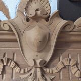 Old sandblasted wooden pediment
