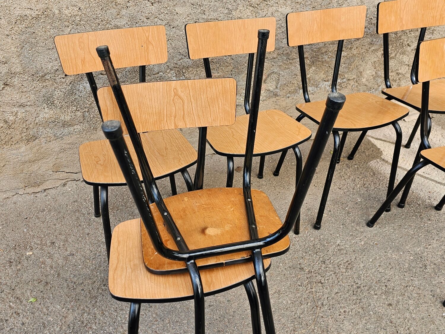 Chairs in black and light brown formica