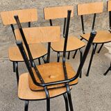 Chairs in black and light brown formica