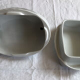 Porcelain duck dish with lid on fire