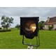 Spotlight on wooden and chrome tripod.