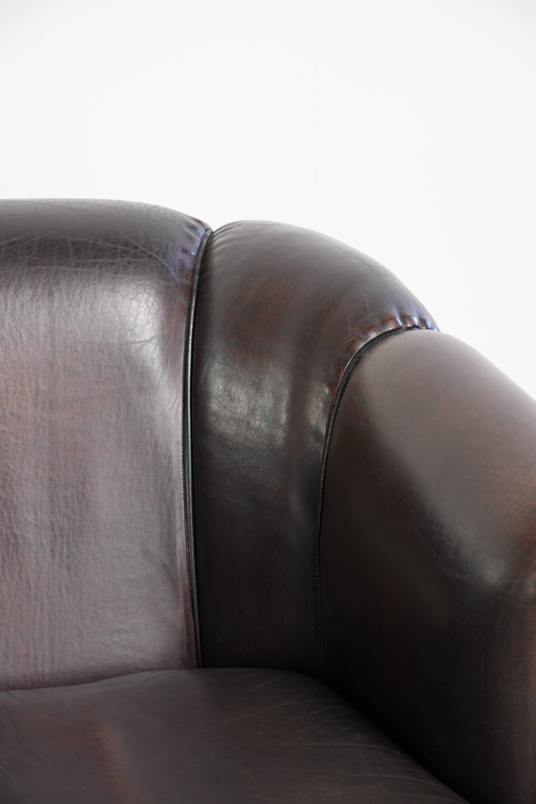 Unique sheepskin 3-seater sofa with deep colours and a distinctive design