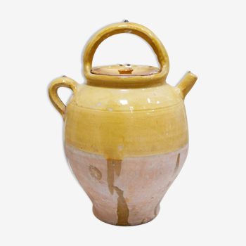 Old gargoulette pot in glazed terracotta