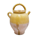 Old gargoulette pot in glazed terracotta