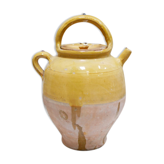 Old gargoulette pot in glazed terracotta