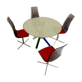 Glass table, colored glass legs joined by opal ring, 4 chairs