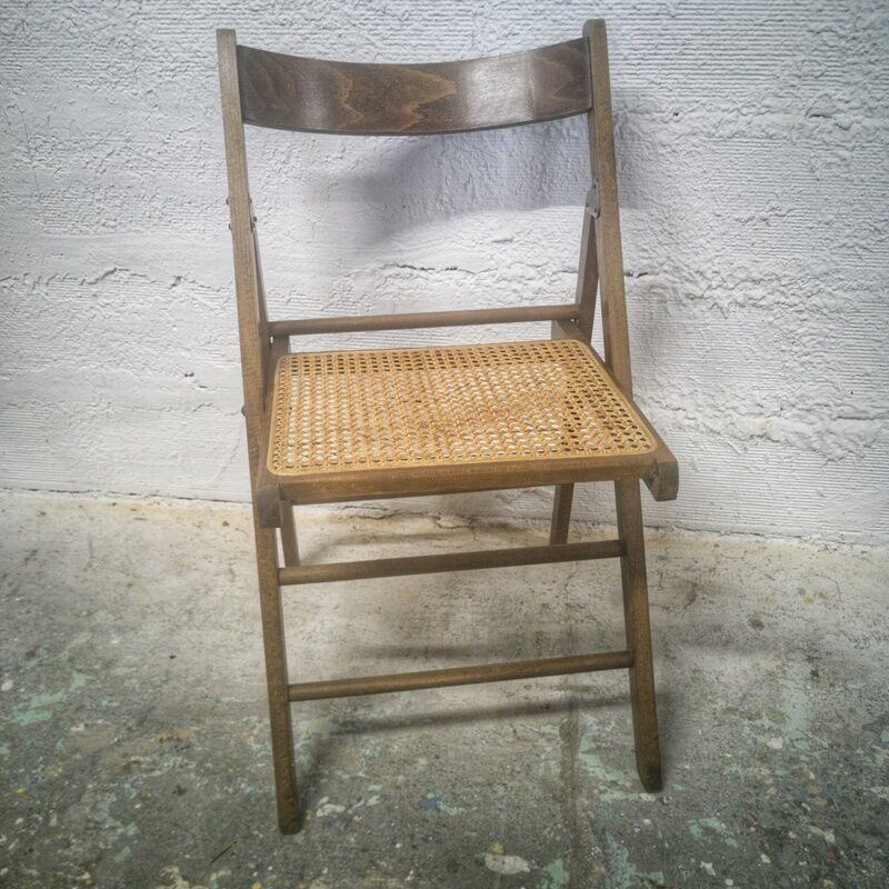 Folding chair with canned seat