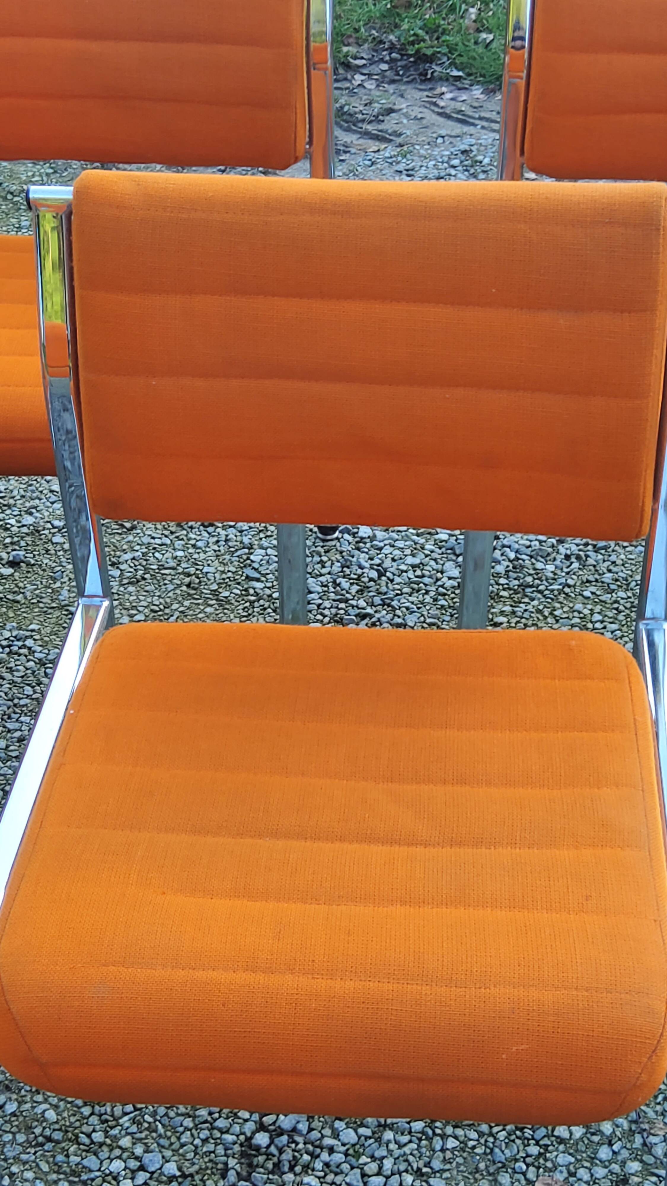 Set of 6 designer chairs from the 70s orange fabrics and chrome tubes