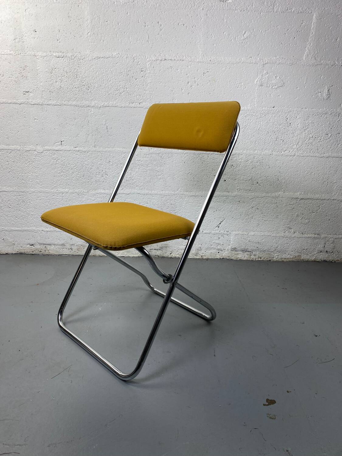 Mustard yellow folding chair