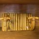 Vintage rattan coat rack with double hanging pegs