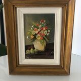 Tableau à fleurs, signé Roger