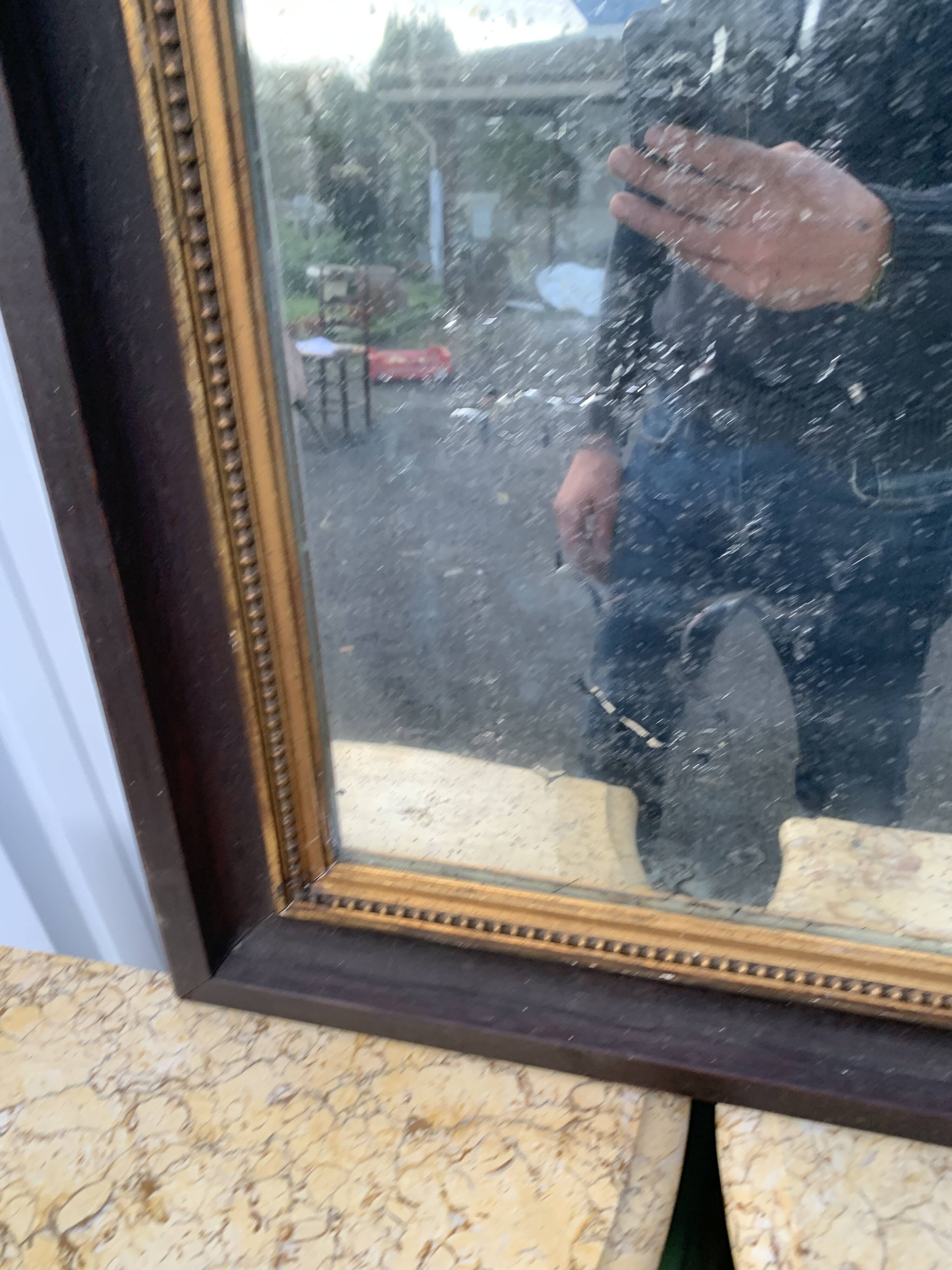 Antique rectangular mirror, carved frame