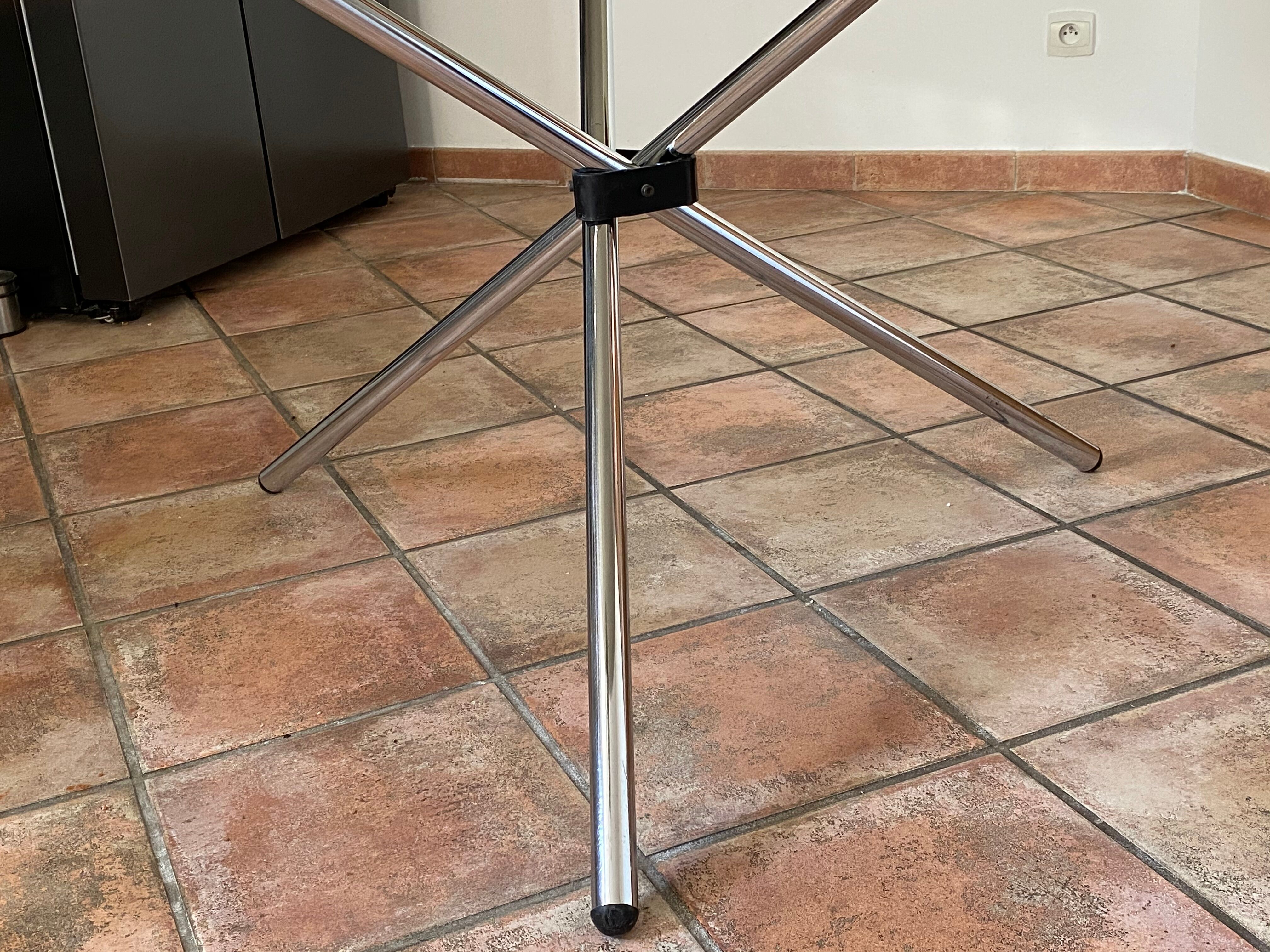 Tripod roundtable steel and glass 1970