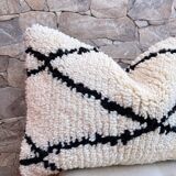 Housse de coussin en laine boho chez un coussin berbère Beni Ourain. Les housses de coussin boho