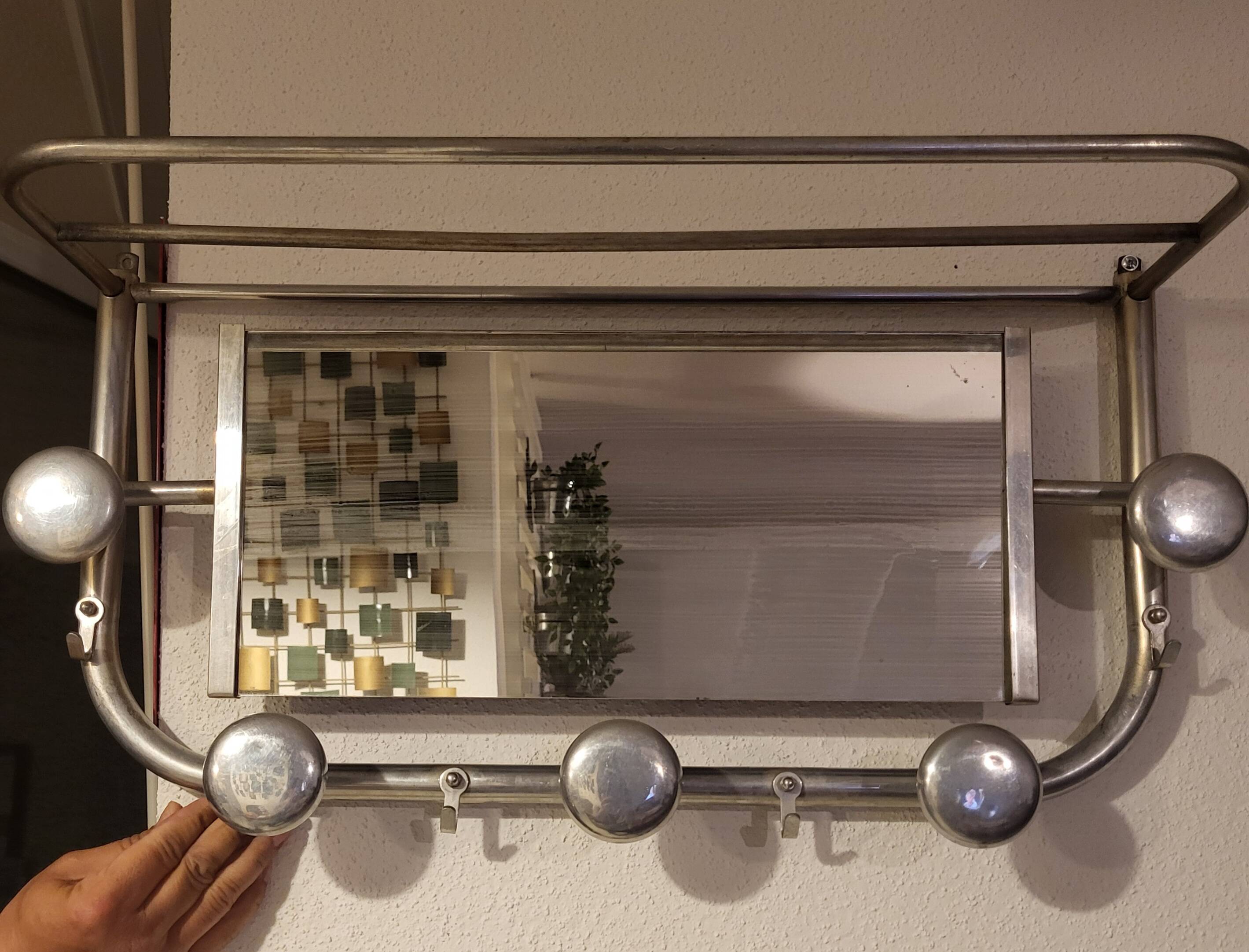 Coat and hat racks in aluminum from the 1950s