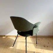 Curved vintage wool armchair from the 1960s