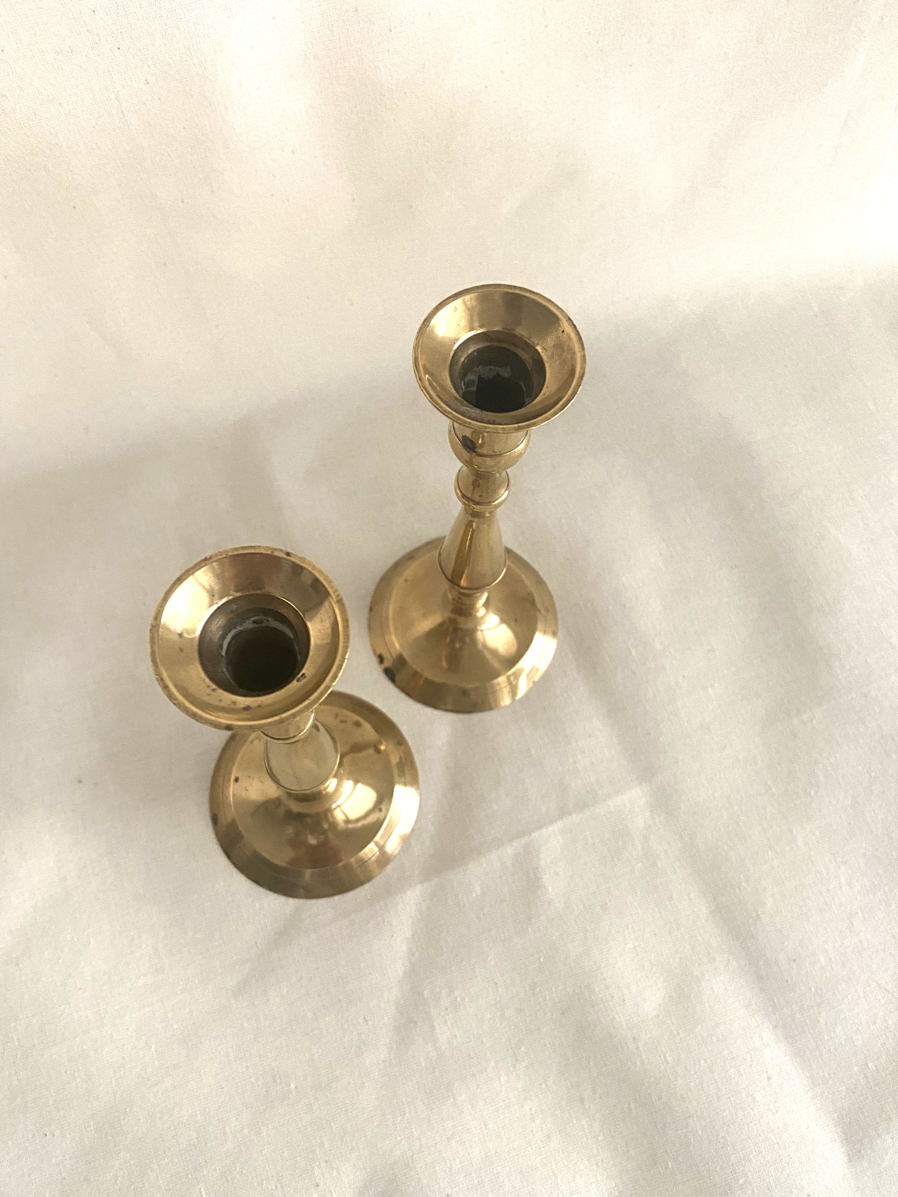 Duo of brass candle holders