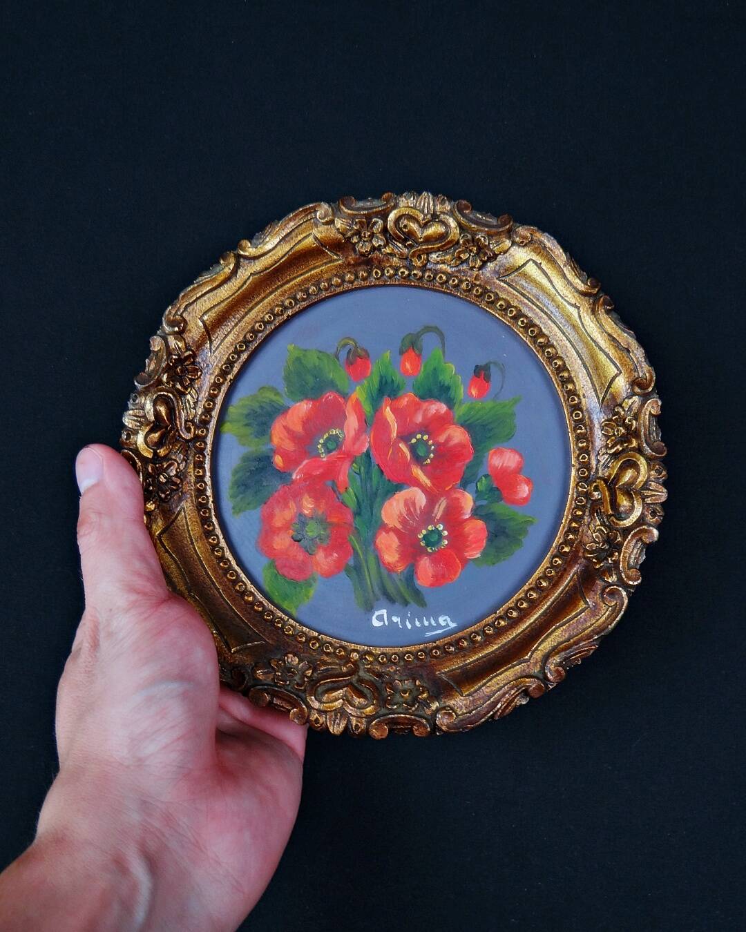 Still life in Tondo oil on panel of a bouquet of poppies signed