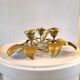 Bronze candle holder with three flowers design 60s - 70s
