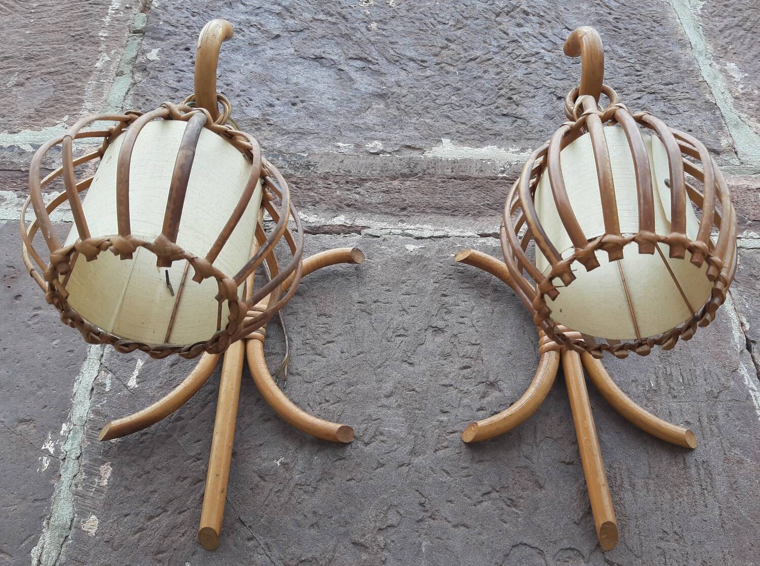 Pair of Louis Sognot rattan wall lights.